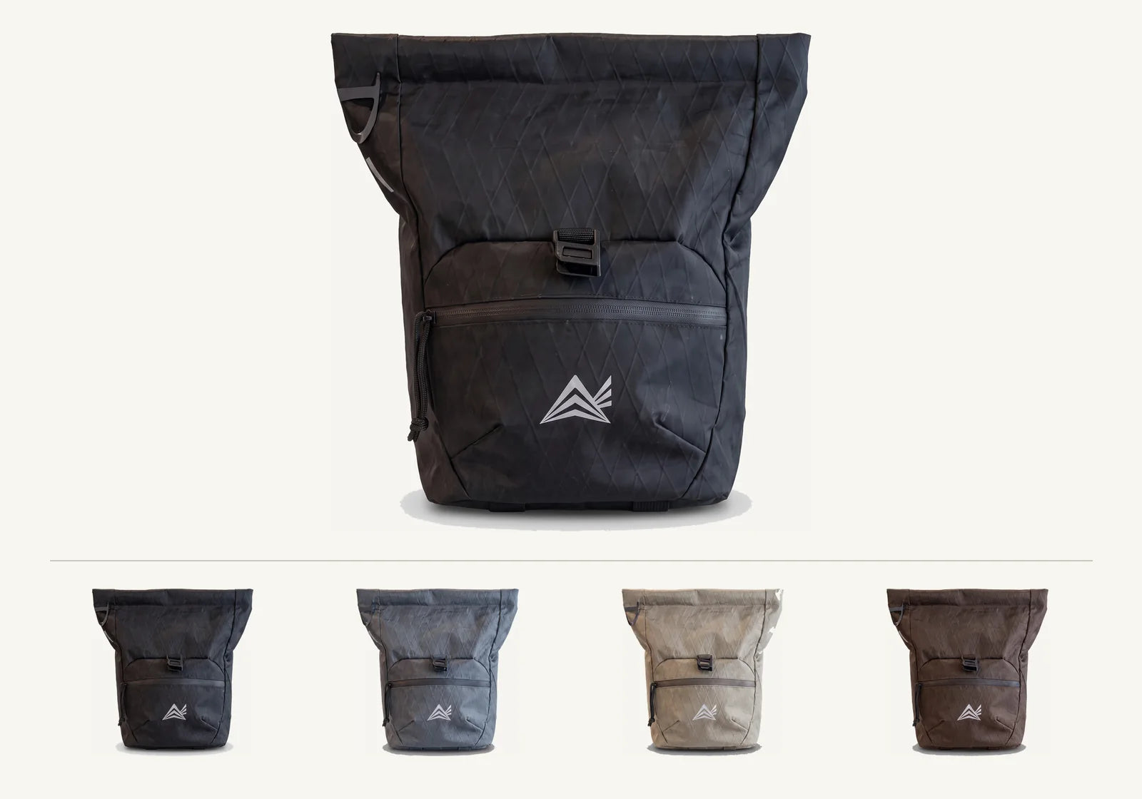 Send Station Bucket in Onyx Black: structured four-layer laminated shell with a magnetic-mechanical closure and shoe straps beneath.