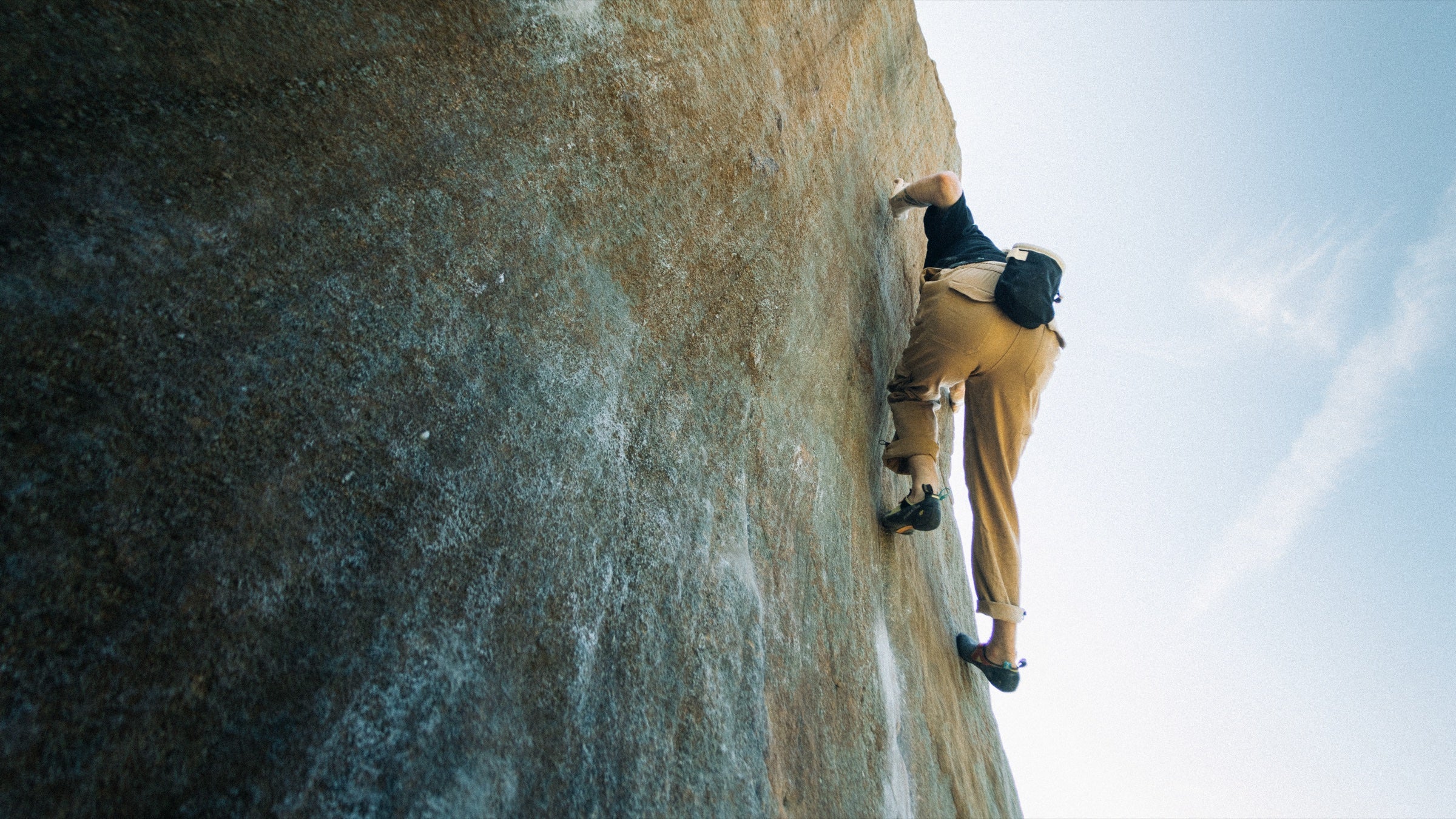 Climber wearing Rúngne pants in the Peak District